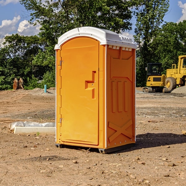 what is the cost difference between standard and deluxe portable restroom rentals in Meggett